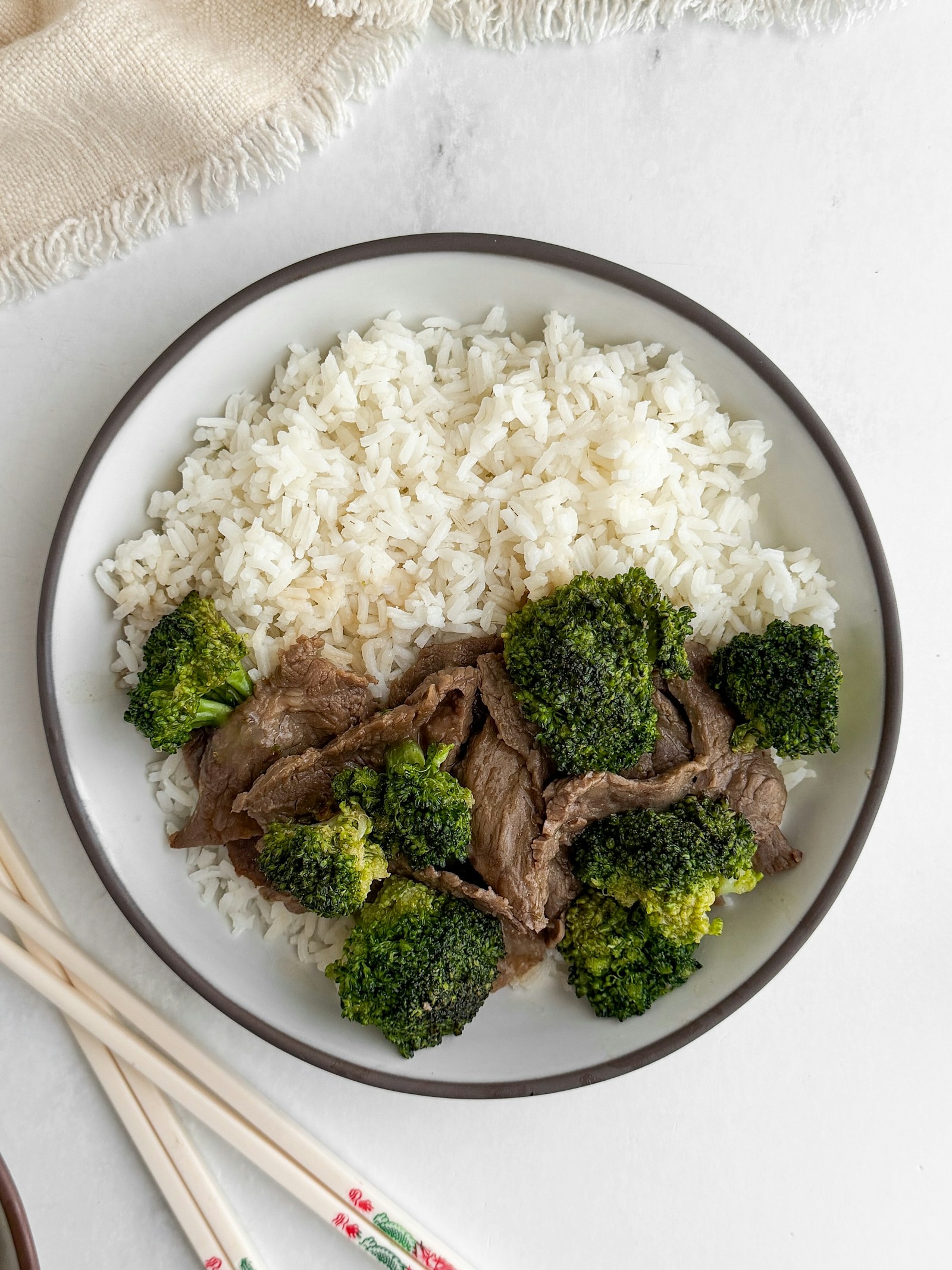 Beef and broccoli served with white rice